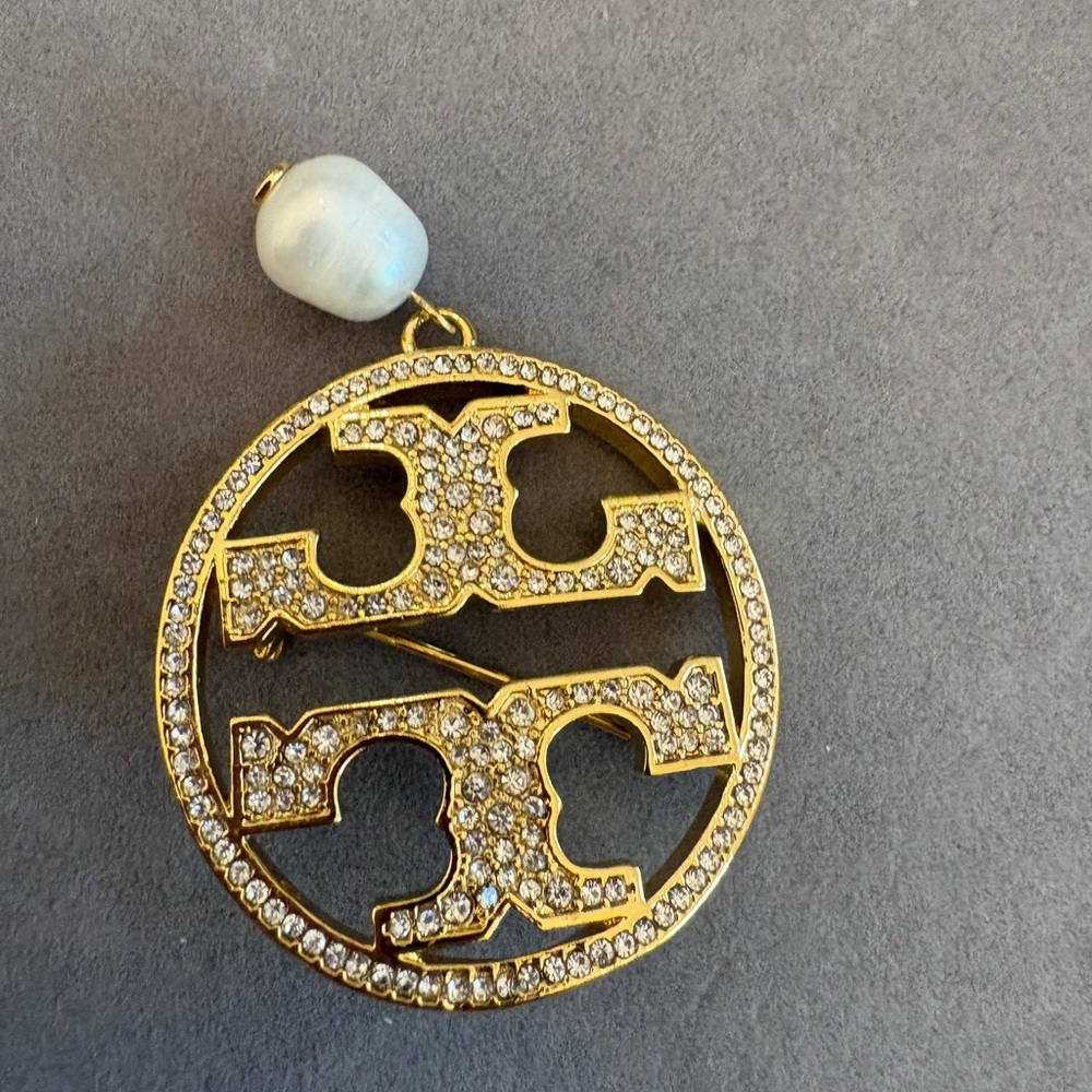 Tory Burch Gold-Tone Crystal Logo Brooch with White Pearl